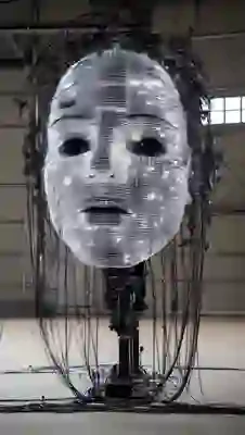 A large, futuristic robotic face with illuminated panels and visible wiring, suspended in a spacious indoor setting.